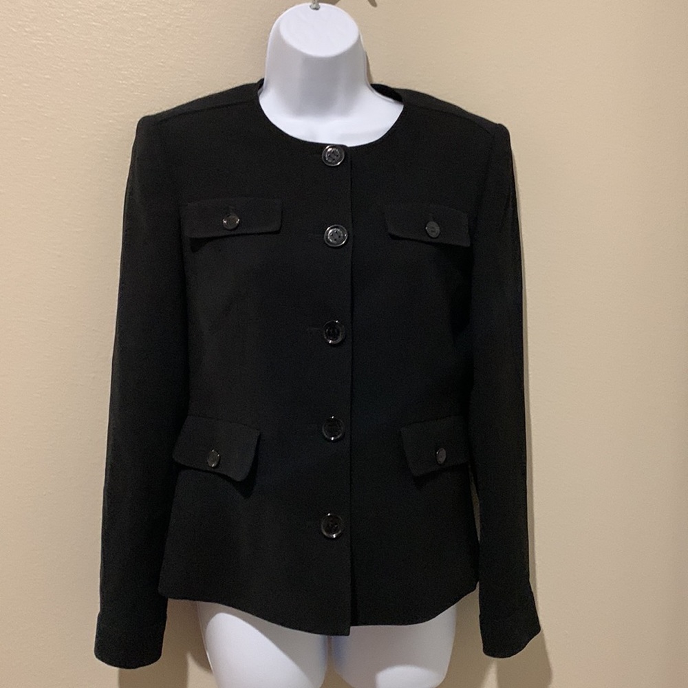 Darling Calvin Kline black jacket.  Size 4.  Fully lined with pretty red trim.